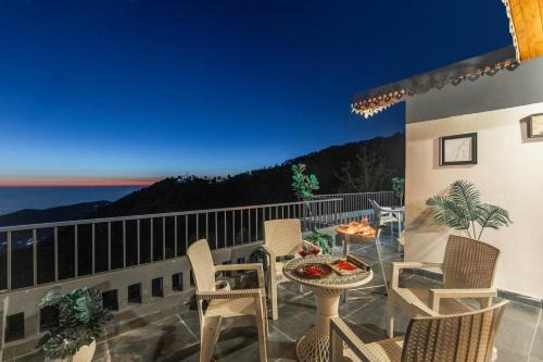 Alaya Stays Evara Serene 4 BHK Hill Retreat with Balcony, Fireplace & Scenic Views