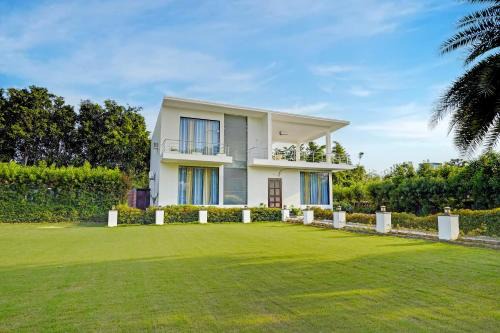 Alaya Stays Tranquil Meadows 5 BHK Farmhouse with Private Pool Gazebo and Lush Garden