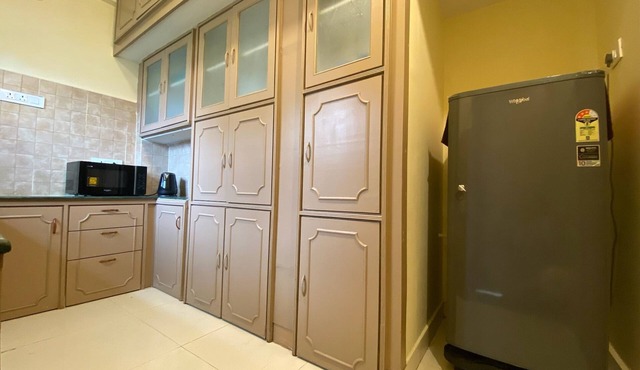 Beachside Getaway:Fully furnished 2BHK, Modern Amenities, WiFi, 200m to sea