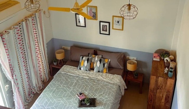 Boho chic art retreat with charming attic in Siolim