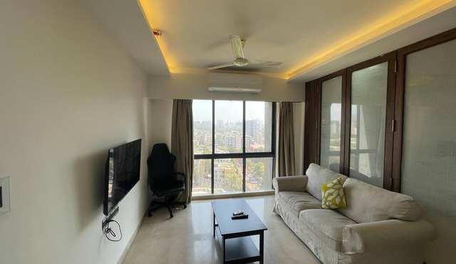 Business-Ready Apt near Jio World Centre | 1BR + Gym + Pool