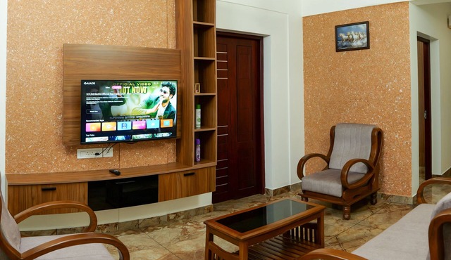 Charming 3-bedroom apartment with AC, WiFi in lovely Koonammavu