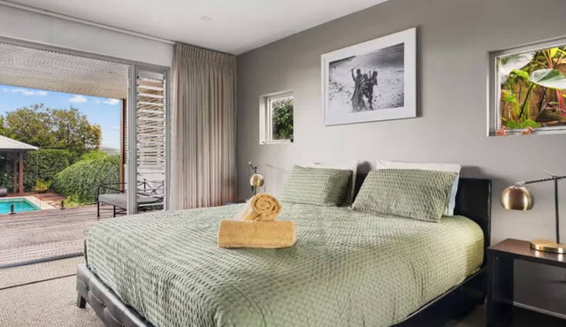 Charming King Bedroom - Pool View - Walking Distance to Beach & Golf Course.