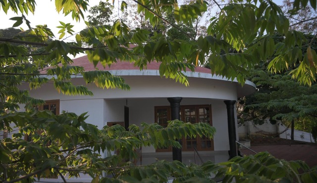 Charming roundhouse villa with garden view