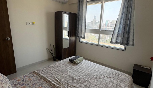 Chic 2-bedroom apartment with WiFi, AC in amazing Pune @ Balewadi High Street