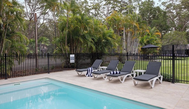 Coastal two acre escape with pool and tennis court. Pet friendly. in Charlotte Bay