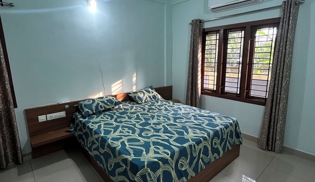 Cozy 1-bedroom apartment in beautiful Kozhikode with AC - Ground floor