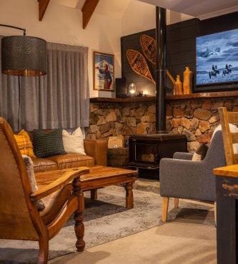 Crackenback Castle free standing chalet with fire place in Thredbo