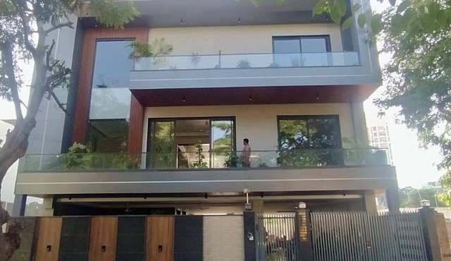 Designer 6 bedroom luxury villa with roof top bar & garden in heart of Gurugram