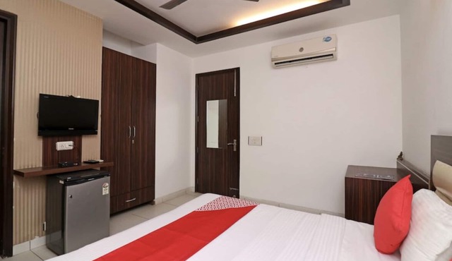 Double Deluxe Room @ Sterling Hotel Rooms With Balcony Near Dlf Ambience Mall