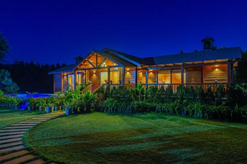 ELIVAAS Riveira Hills - 3 BHK Wooden Cottage with Lush Garden, Pvt Pool
