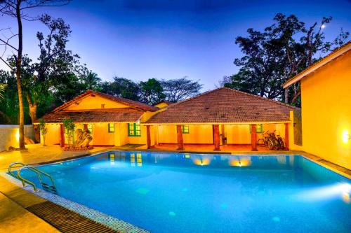 ELIVAAS Terra Rosa Portuguese-styled 4-BHK Villa With Private Pool, Garden, Veranda & Sit-out Area