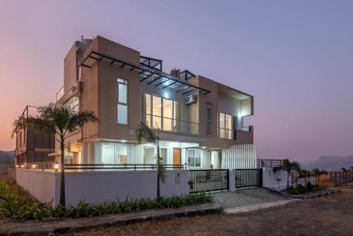 ELivaas White House 3 BHK Villa With panoramic Hill Views, Glass Room, Outdoor Pool & Dam nearby
