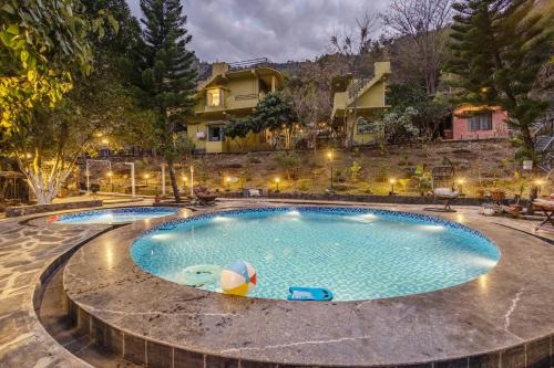 ELIVAAS Zephyr Sierra - 2 BHK Hillside Retreat With Common Pool, Gym & Restaurant