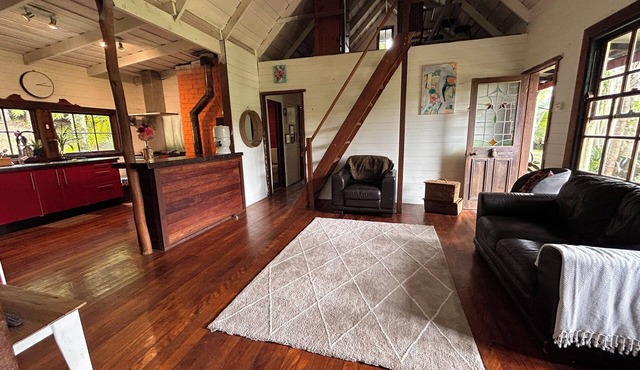 Hidden among lush rainforest and towering palms, a charming family retreat in Blue Knob