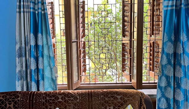 Home away from Home in a city with Garden View. Experience the magic yourself