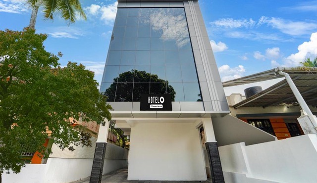 Hotel O HMT Colony Kochi Formerly Pullans Arcade