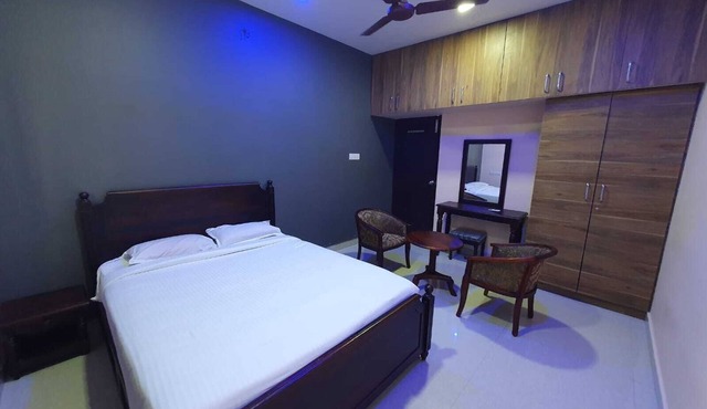 Kousthubam Residency provides comfortable rooms for a calm and relaxing stay