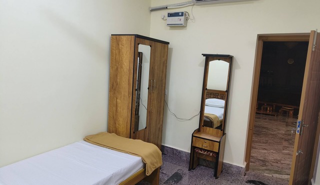Ks rooms near by temple and giripradashan road car parking available