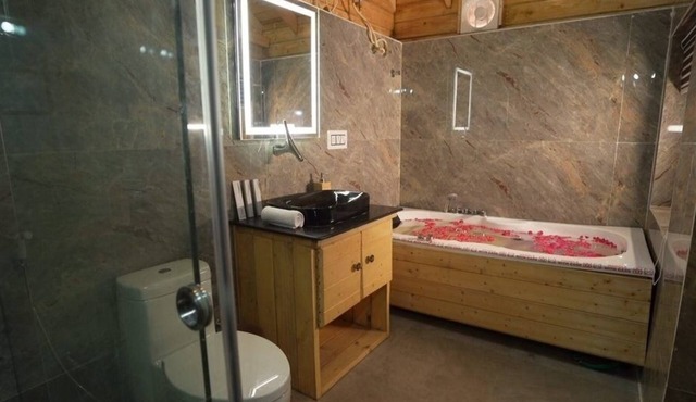 Lovely Wooden Cottage KPHB - A Dreamy Getaway with Nature, Wood, and a Jacuzzi.