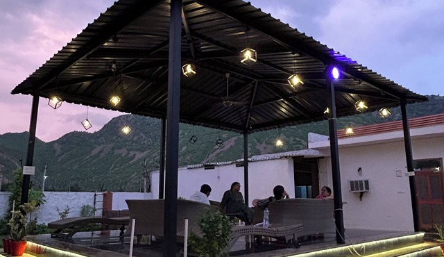 Nestled amidst majestic mountains, our farmhouse offers a serene and picturesque