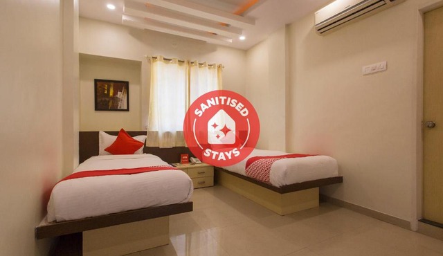 OYO 11566 Shree Swami Apartment