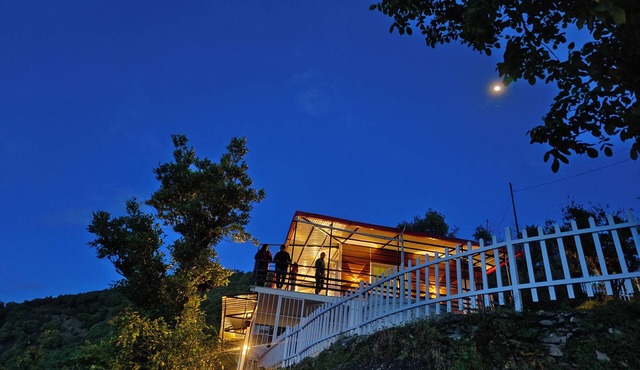 Panoramic views of the Doon Valley and Mussoorie Hills - A Serene Hideaway.