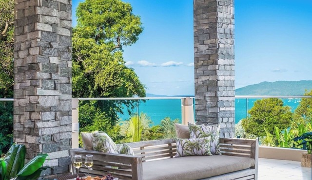 Peaceful 4 Bed 3 Bath property overlooking Pioneer Bay & Airlie Beach beyond in Woodwark