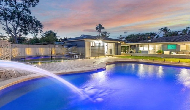 Poolside Family Retreat by HolidayCo.