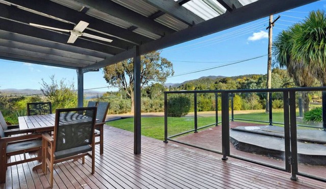 Relax in the spa with views opposite Lake Eildon in Goughs Bay