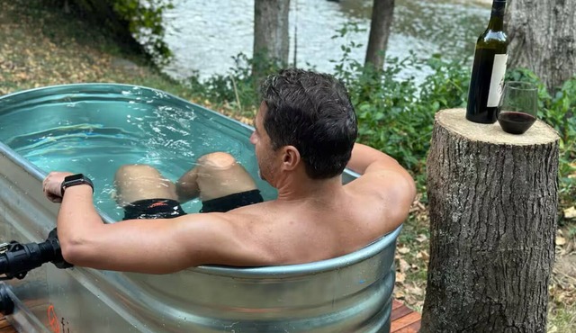 Riverfront front cabin with sauna and hot tub overlooking the river. in Jamieson