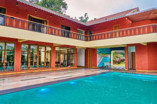 SaffronStays Aamelia by the Hills - 5BR pet-friendly villa with games room, waterfall & Anjaneri mountain views