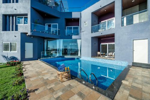 SaffronStays Blueberry - 4BR Panchgani villa with pool, bar lounge & terrace, lush garden vibes for family celebrations