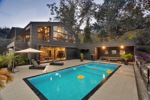 SaffronStays Earl Grey - 3BR pet-friendly pool villa with theatre, pool table, BBQ & glass balconies for open views