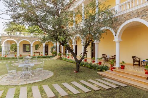 SaffronStays Kanota Courtyard