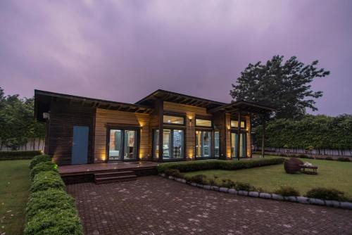 SaffronStays Paradise Pines, Dehradun - cliff villa with valley & forest views