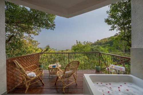 SaffronStays Raanwaara Luxe - 2BR villa with dual balcony jacuzzis, infinity swing & private waterfall, luxurious escape