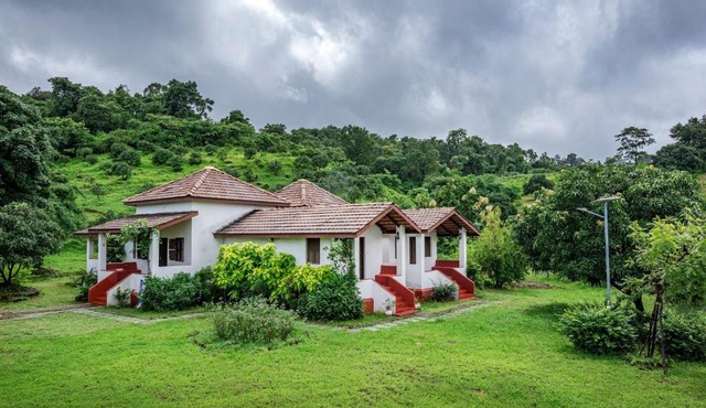 SaffronStays Sattva - 2BR Konkani-style eco farmhouse with wood-fired copper baths, orchard, forest walks & stargazing