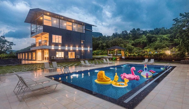SaffronStays Sundowner - 8BR Morbe-view villa, grand pool, outdoor bar, gazebo, TT & pool table, rain dance, award-winning