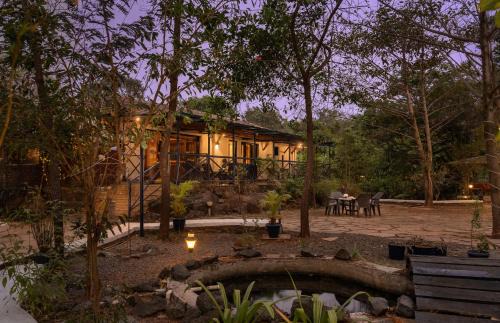SaffronStays Terra Soul - 3BR eco-luxury pet-friendly pool villa with gazebos, bar & fish pond near Imagica & Pali Temple