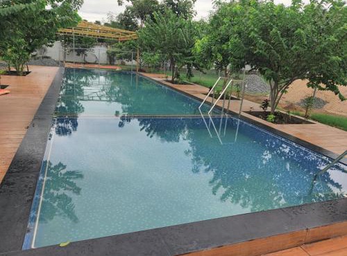 Sivarama garden resort 8 AC living hall with 8 AC BHK stay &2 swimming pools& Box Cricket, settil and all near beach road, vishakhapatnam