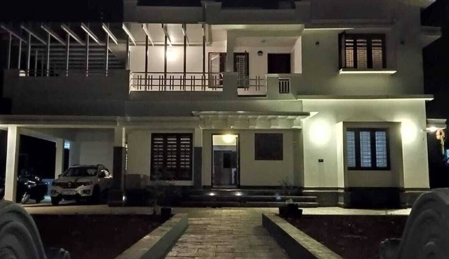 Spacious 4-bedroom house with WiFi, AC in serene Kannur