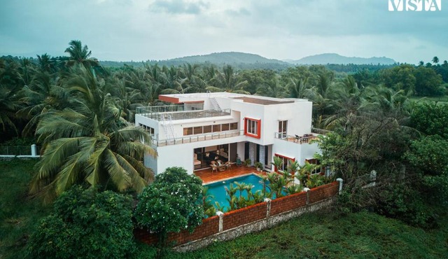 StayVista at Azure Bliss with Huge Pool, BBQ, Wi-Fi