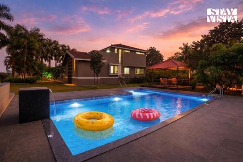 StayVista at Canton Villa with Outdoor Pool, AC, WiFi