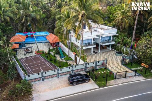 StayVista at Lagoons Kuruva with Shared Pool, Lawn