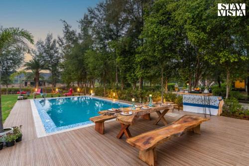 StayVista at Meadow Muse with Outdoor Pool - Manesar