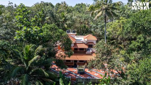 StayVista at Nayara Farmhouse with AC, Wifi