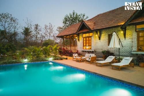 StayVista at Orchard by the River with Bonfire, BBQ