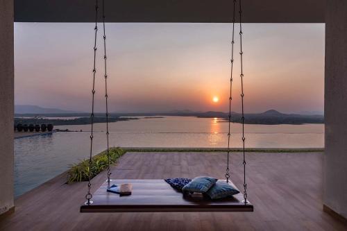 StayVista at Sunset on the Lake - Infinity Lakeview Swimming Pool with Contemporary Interiors & Lavish Amenities