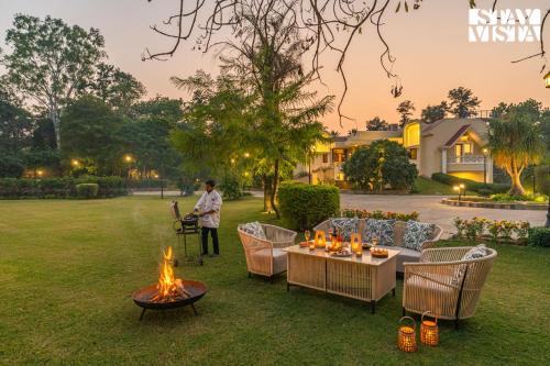 StayVista at The Birdwood Estate with Gym and Pool